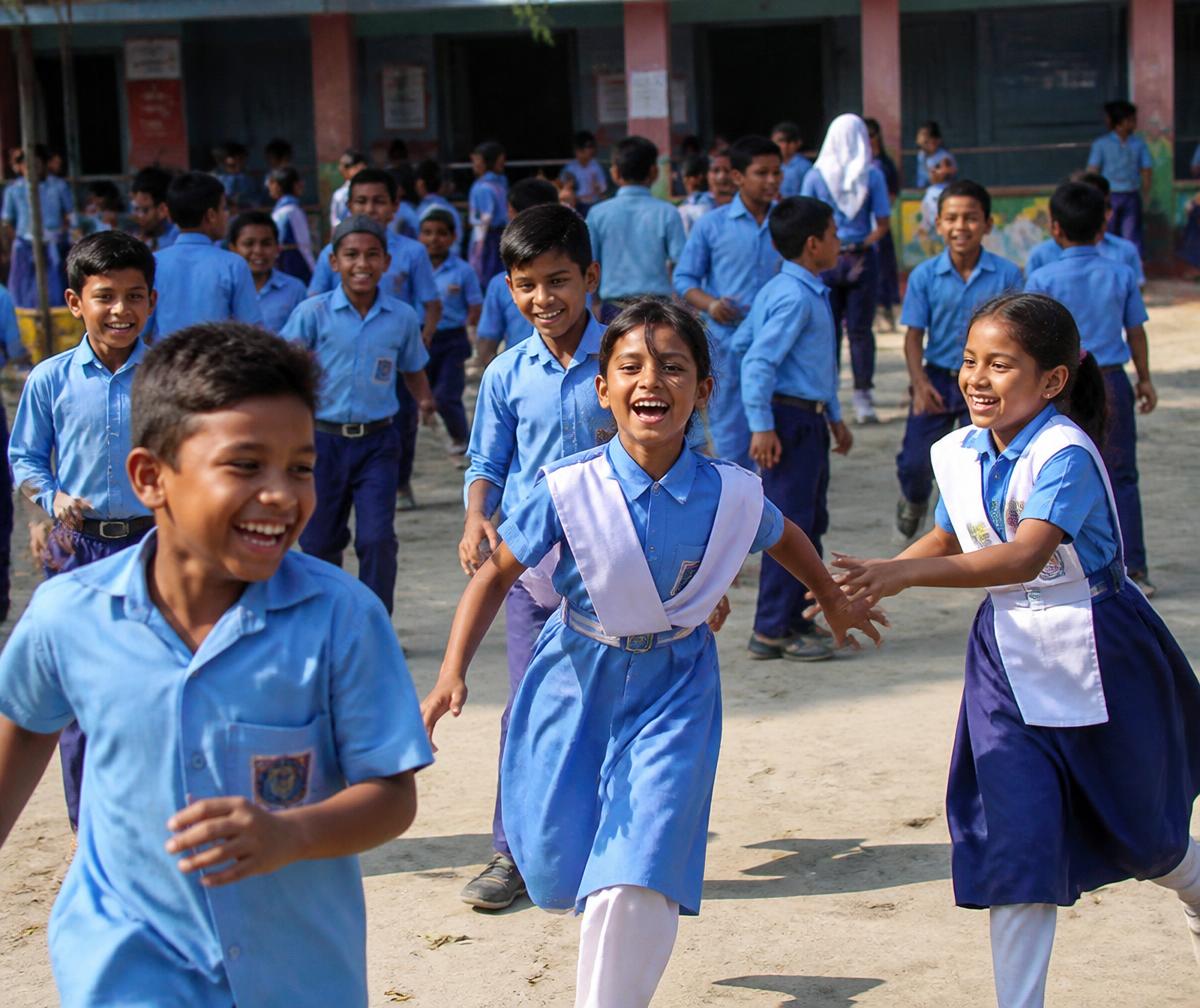 Children playing happily in the school grounds during break time